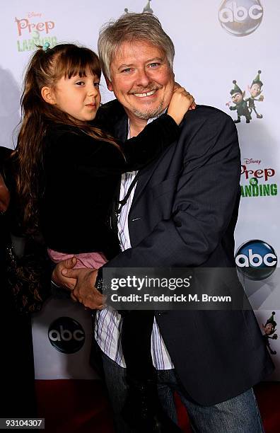 Actor Dave Foley and his daughter attend the "Prep & Landing" film premiere at The El Capitan Theatre on November 16, 2009 in Hollywood, California.