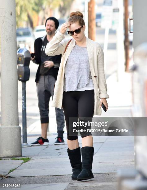 Darren Le Gallo and Amy Adams are seen on March 12, 2018 in Los Angeles, California.