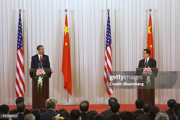 President Barack Obama, left, issues a joint press statement with Hu Jintao, China's president, in Beijing, China, on Tuesday, Nov. 17, 2009. Obama...