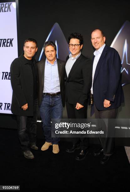 Producer Bryan Burk, Brad Grey, J.J. Abrams and Rob Moore arrive at the Star Trek DVD and Blu-Ray release party at the Griffith Observatory on...