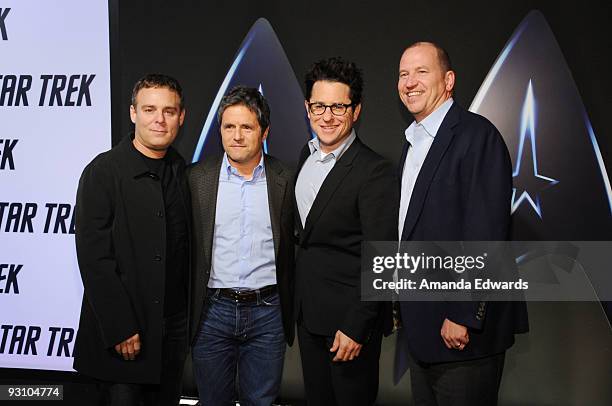 Producer Bryan Burk, Brad Grey, J.J. Abrams and Rob Moore arrive at the Star Trek DVD and Blu-Ray release party at the Griffith Observatory on...