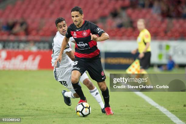 Marcela Carrusca of the Wanderers gets past Phoenix's Sarpreet Singh during the round 22 A-League match between the Western Sydney Wanderers and the...