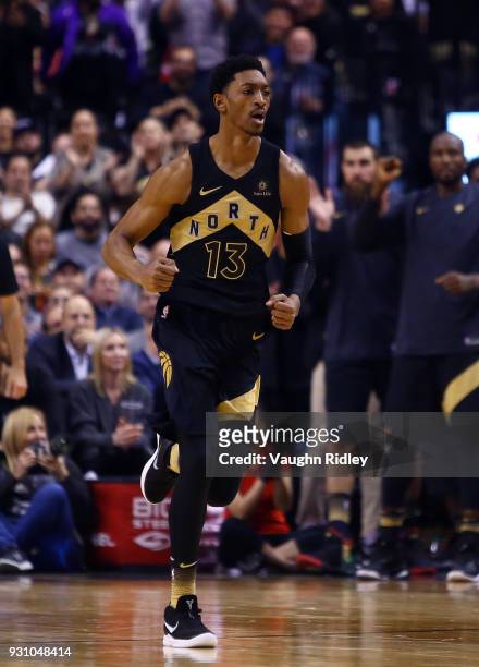 Malcolm Miller of the Toronto Raptors runs up court during the first half of an NBA game against the Houston Rockets at Air Canada Centre on March 9,...