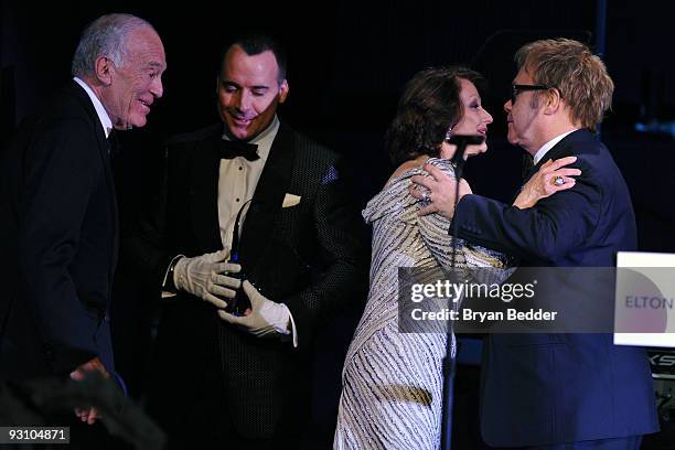 Leonard Lauder, David Furnish, Evelyn Lauder and Sir Elton John appear onstage at the 8th Annual Elton John AIDS Foundation�s "An Enduring Vision" at...