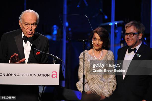 Leonard Lauder speaks and Evelyn Lauder and Sir Elton John appear onstage at the 8th Annual Elton John AIDS Foundation�s "An Enduring Vision" at...