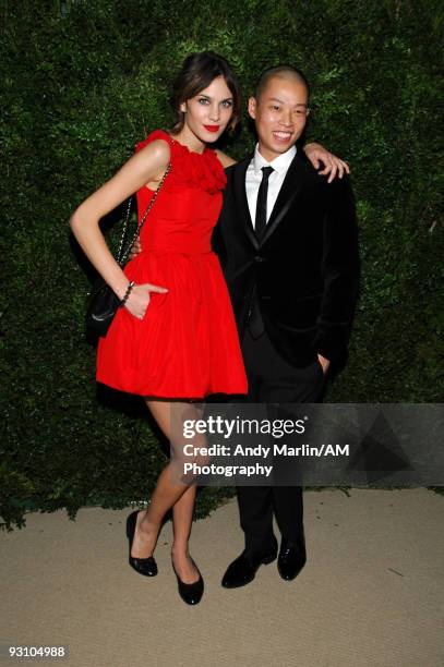 Talk show host Alexa Chung and fashion designer Jason Wu pose for a photo at the CFDA/Vogue Fashion Fund Awards at Skylight Studio on November 16,...