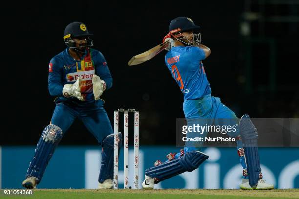 Indian cricketer Manish Pandey plays a shot during the 4th Twenty-20 cricket match of NIDAHAS Trophy between Sri Lanka and India at R Premadasa...