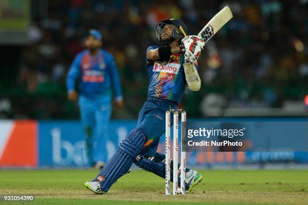 Sri Lankan cricketer Kusal Mendis plays a shot during the 4th Twenty-20 cricket match of NIDAHAS Trophy between Sri Lanka and India at R Premadasa...