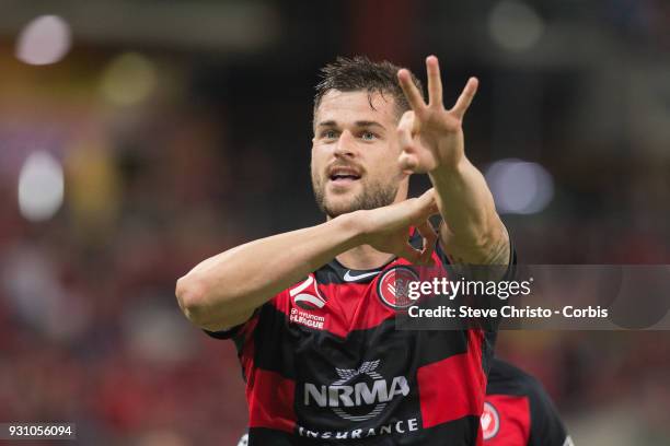 Brendan Hamill of the Wanderers celebrates scoring his second goal and the teams third goal during the round 22 A-League match between the Western...