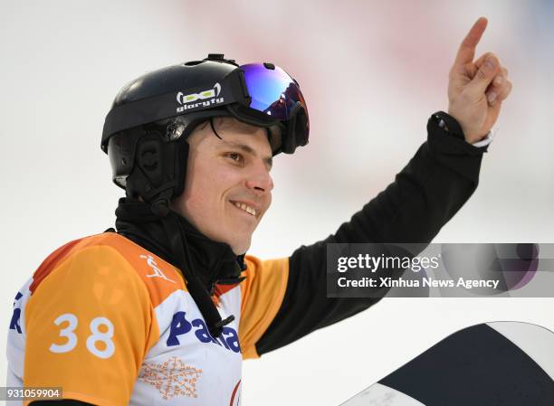 March 12, 2018 : Matti Suur-Hamari from Finland celebrates during the awarding ceremony for the Men's Snowboard Cross SB-LL2 event of the 2018...