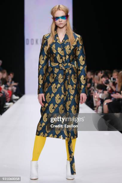 Model walks the runway during the ANASTASIA DOKUCHAEVA fashion show at Mercedes Benz Fashion Week Russia Fall/Winter 2018/19 at Manege on March 12,...