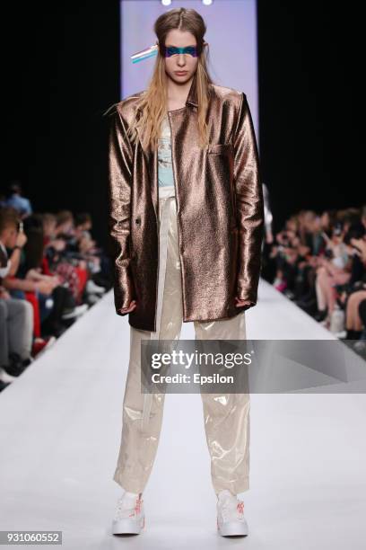 Model walks the runway during the ANASTASIA DOKUCHAEVA fashion show at Mercedes Benz Fashion Week Russia Fall/Winter 2018/19 at Manege on March 12,...