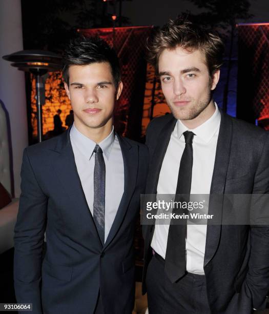 Actors Taylor Lautner and Robert Pattinson arrive at the afterparty for the premiere of Summit Entertainment's "The Twilight Saga: New Moon" at the...