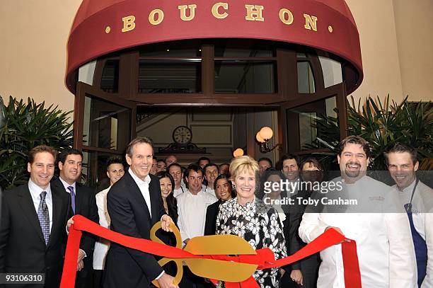 Thomas Keller cuts the ribbon with Beverly Hills Mayor Nancy Krasne and staff at the grand opening of Thomas Keller's Bouchon in Beverly Hills on...