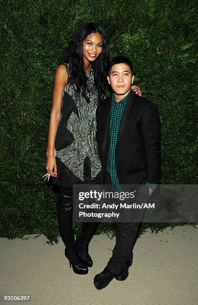 Model Chanel Iman and designer Thakoon pose for a photo at the CFDA/Vogue Fashion Fund Awards at Skylight Studio on November 16, 2009 in New York...