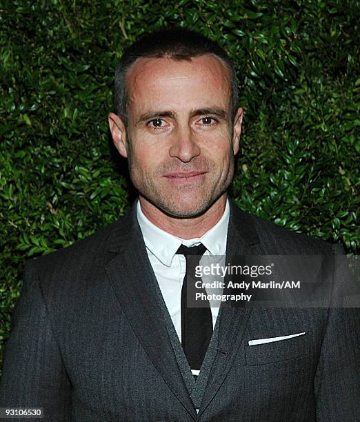Designer Thom Browne poses for a photo at the CFDA/Vogue Fashion Fund Awards at Skylight Studio on November 16, 2009 in New York City.