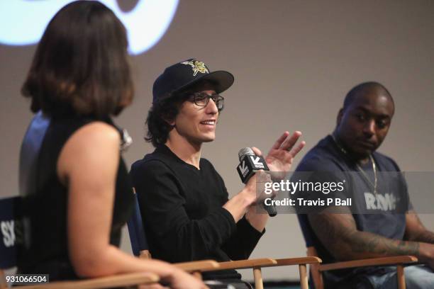 Director/showrunner Evan Rosenfeld and NFL player Duke Johnson speak onstage at the premiere of "Warriors of Liberty City" during SXSW at Vimeo on...