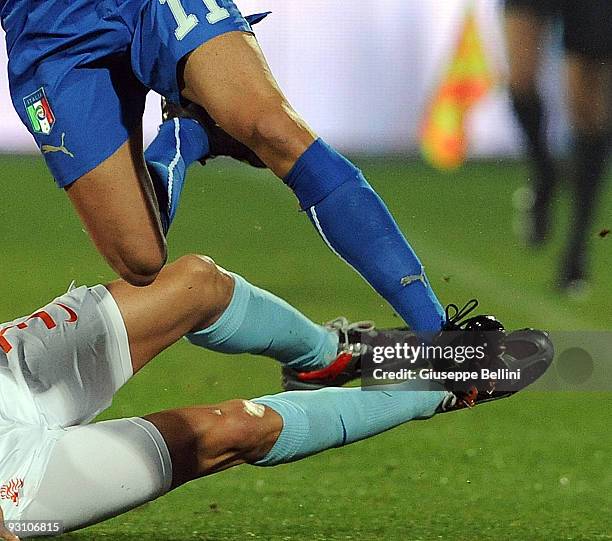 John Heitinga of Holland and Raffaele Palladino of Italy in action during the International Friendly Match between Italy and Holland at Adriatico...