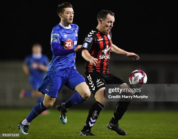 Waterford , Ireland - 12 March 2018; Derek Pender of Bohemians in action against Derek Daly of Waterford during the SSE Airtricity League Premier...