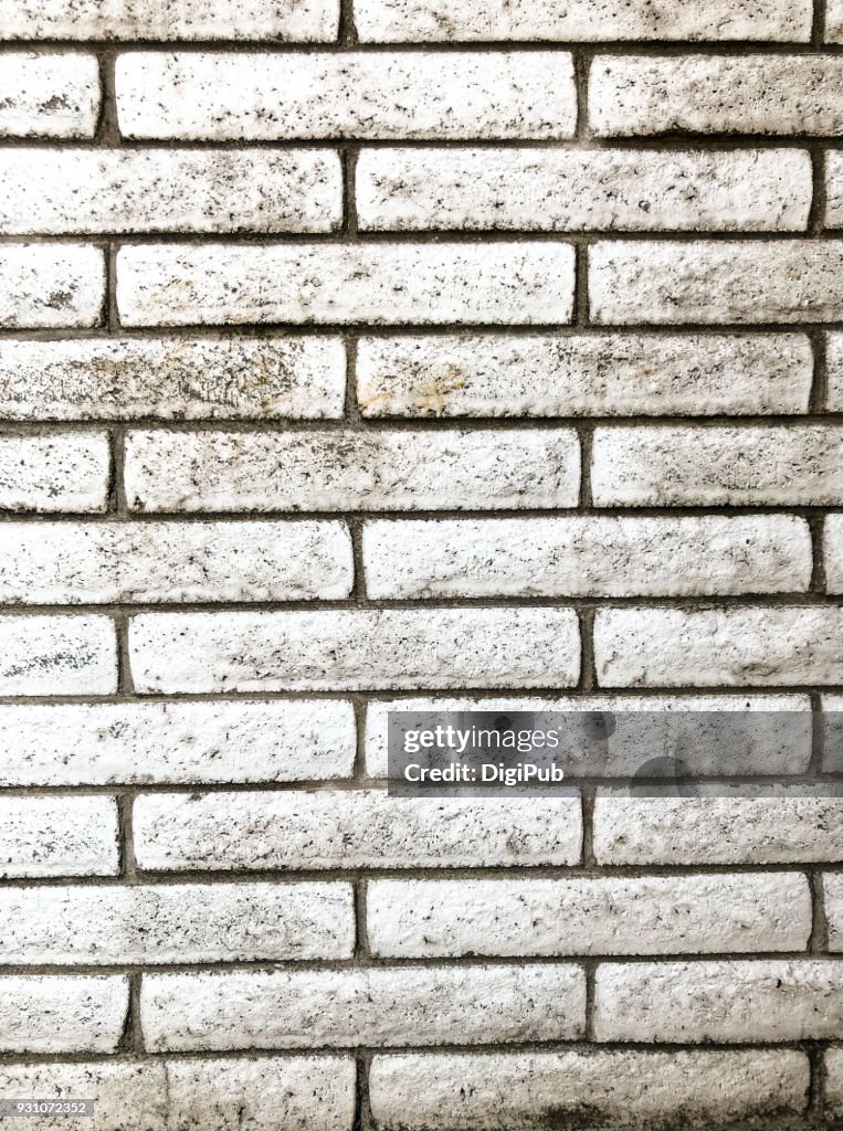Dirty white painted brick wall texture