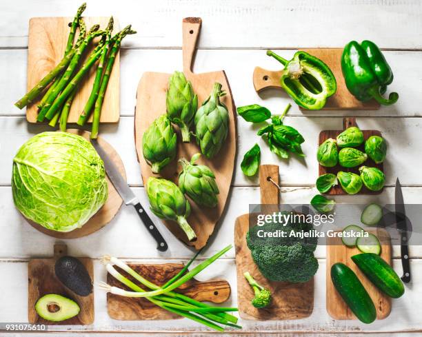 green vegetables and herbs assortment. fresh organic produce. healthy food. - faca de cozinha imagens e fotografias de stock