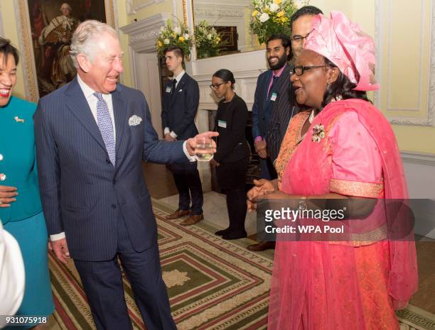 Prince Charles, Prince of Wales meets a guest during the 2018 Commonwealth Day reception at Marlborough House on March 12, 2018 in London, England.