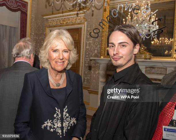 Camilla, Duchess of Cornwall meets Daniel Hatton of the Commonwealth Fashion Council during the 2018 Commonwealth Day reception at Marlborough House...