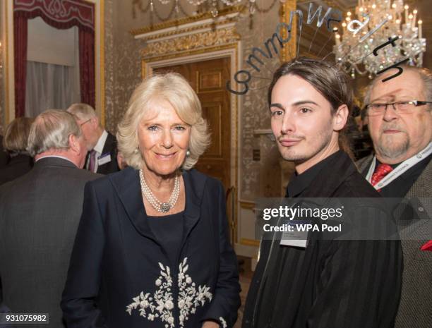 Camilla, Duchess of Cornwall meets Daniel Hatton of the Commonwealth Fashion Council during the 2018 Commonwealth Day reception at Marlborough House...