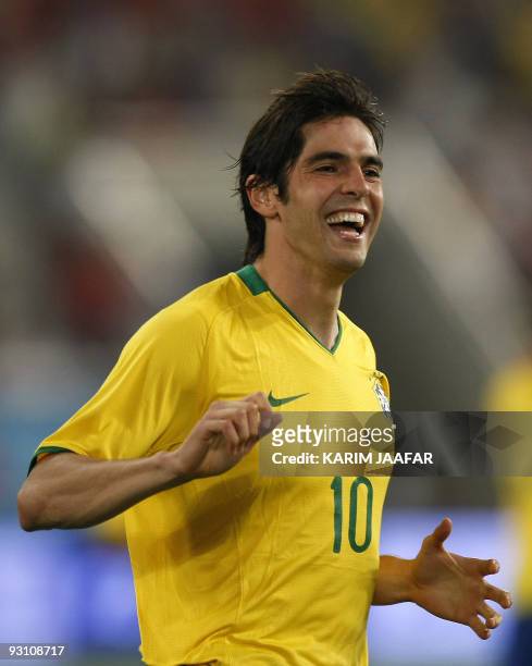 Brazil's Kaka celebrates after teammate Nilmar scored a goal against England during their friendly football match at the Khalifa Stadium in the...