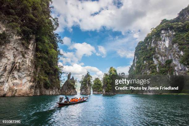 tourists in thailand boat - kao sok national park imagens e fotografias de stock