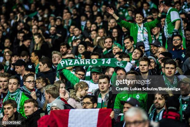 Fans of Bremen and Claudio Pizarro support Pizarro after the Bundesliga match between SV Werder Bremen and 1. FC Koeln at Weserstadion on March 12,...