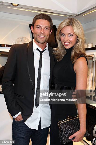 Heath Meldrum and Brodie Harper attend the opening of the new Versace store at Melbourne's Crown complex on November 17, 2009 in Melbourne, Australia.