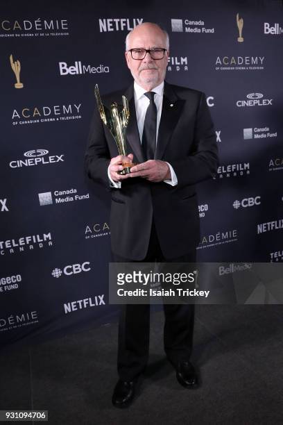 Peter Mansbridge poses in the press room at the 2018 Canadian Screen Awards at Sony Centre for the Performing Arts on March 11, 2018 in Toronto,...