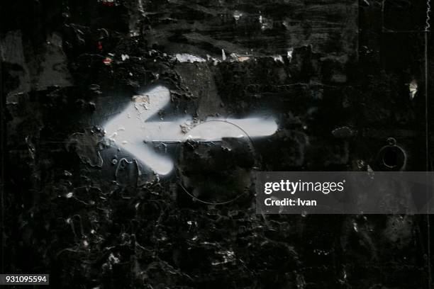 full frame texture, graffiti iron wall with the left arrow pattern - graffiti arrow stock pictures, royalty-free photos & images