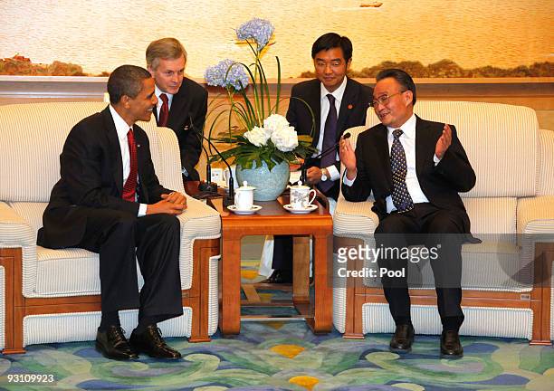 President Barack Obama and Wu Bangguo, Chairman of China's National People's Congress, attend talks at the Great Hall of the People on November 17,...