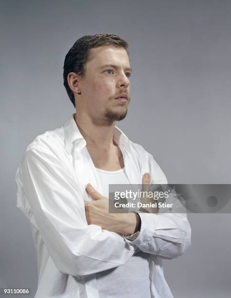 Fashion designer Alexander McQueen poses for a portrait shoot in London on January 15, 2003.