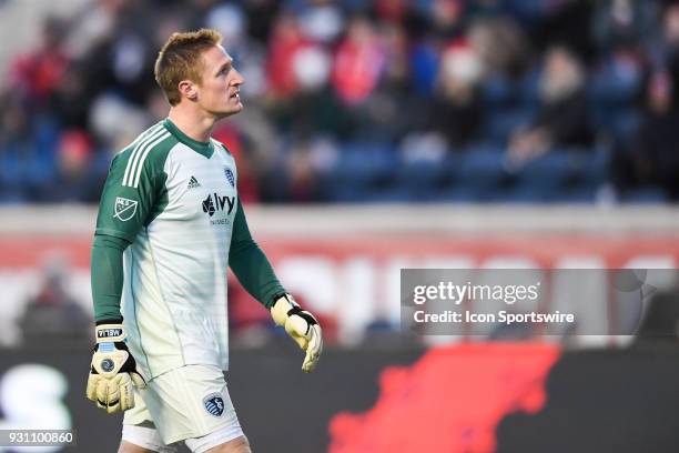 Sporting Kansas City goalkeeper Tim Melia looks at the scoreboard during a game between Sporting Kansas City and the Chicago Fire on March 10 at...