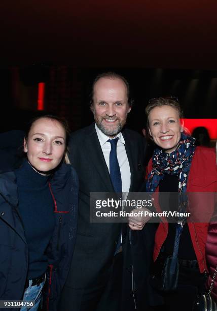 Jean-Marc Dumontet standing between Alexandra Lamy and her sister Audrey Lamy attend "Les Monologues du Vagin - The Vagina Monologues" during...