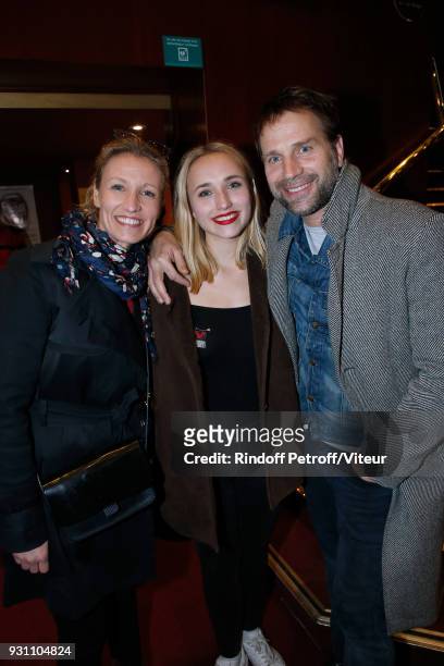 Chloe Jouannet standing between her parents Alexandra Lamy and Thomas Jouannet attend "Les Monologues du Vagin - The Vagina Monologues" during...