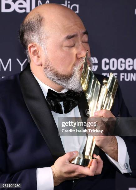 Paul Sun-Hyung Lee poses in the press room at the 2018 Canadian Screen Awards at Sony Centre for the Performing Arts on March 11, 2018 in Toronto,...