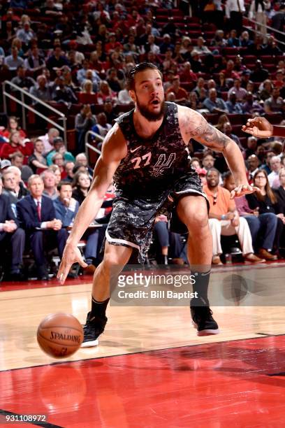 Joffrey Lauvergne of the San Antonio Spurs handles the ball against the Houston Rockets on March 12, 2018 at the Toyota Center in Houston, Texas....