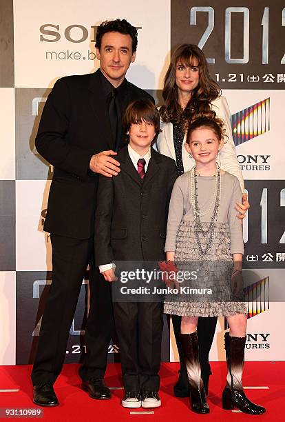 Actors John Cusack, Liam James, Amanda Peet and Morgan Lily attends the "2012" Japan Premiere at Roppongi Hills on November 17, 2009 in Tokyo, Japan....