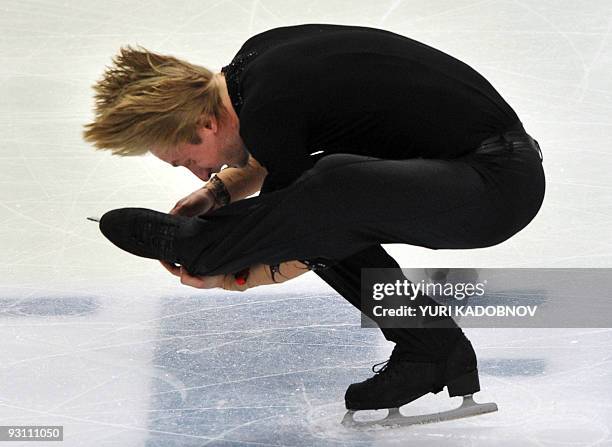 Evgeny Plushenko of Russia performs his free program at the ISU Grand Prix Rostelecom Cup in Moscow on October 24, 2009. He won the first place. AFP...