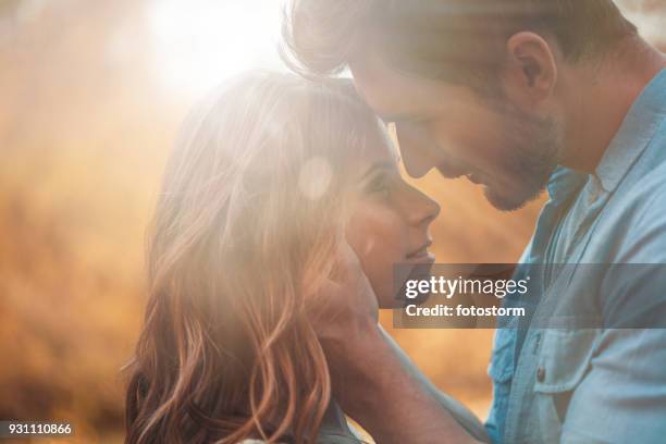 intimate moment - couple april stock pictures, royalty-free photos & images