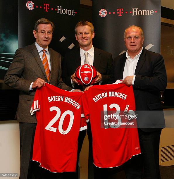 Henning Stiegenroth , Head of sports marketing of Deutsche Telekom AG, Uli Hoeness , manager of FC Bayern Muenchen and Karl Hopfner, CFO of FC Bayern...