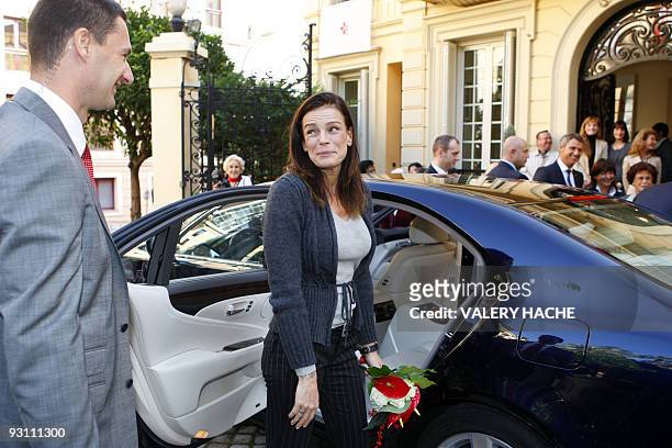 Princess Stephanie of Monaco leaves the Red Cross headquarters in Monaco after giving parcels to Monaco's residents during an annual charity...