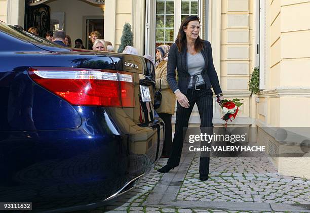 Princess Stephanie of Monaco leaves the Red Cross headquarters in Monaco after giving parcels to Monaco's residents during an annual charity...