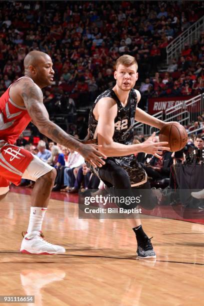 Davis Bertans of the San Antonio Spurs handles the ball against the Houston Rockets on March 12, 2018 at the Toyota Center in Houston, Texas. NOTE TO...