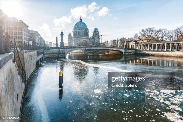 ice on spree river with berlin cathedral - berlin cathedral stock pictures, royalty-free photos & images