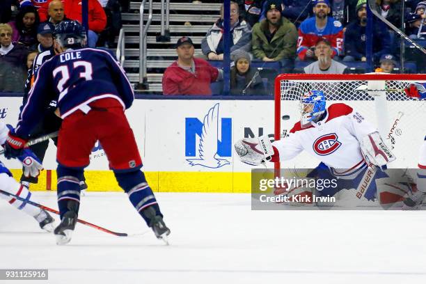 Ian Cole of the Columbus Blue Jackets beats Charlie Lindgren of the Montreal Canadiens for a goal during the third period on March 12, 2018 at...